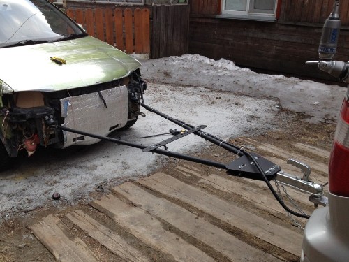 Перегон автомобилей на жесткой сцепке.